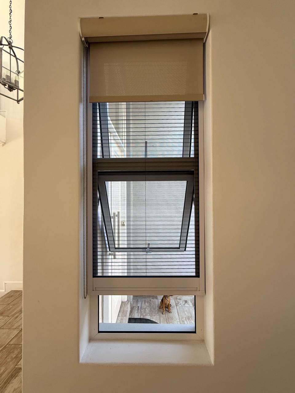 Custom flyscreen fitted to an aluminium window 1