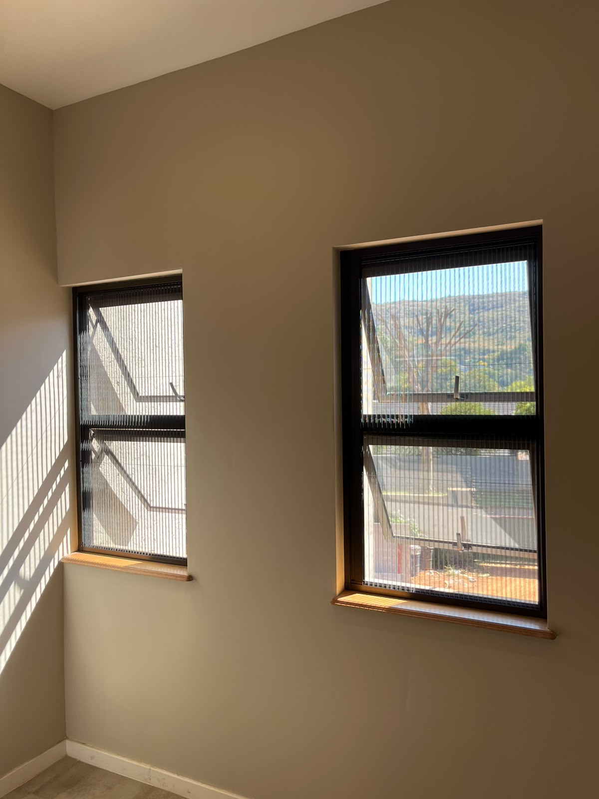 Custom flyscreen fitted to an aluminium window 2