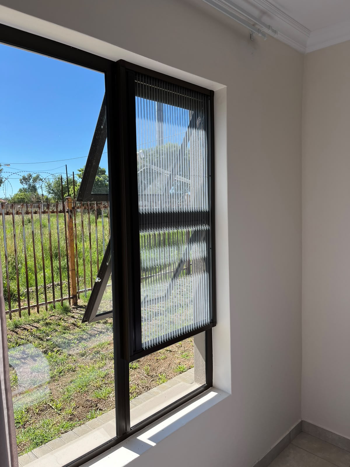 Custom flyscreen fitted to an aluminium window 6