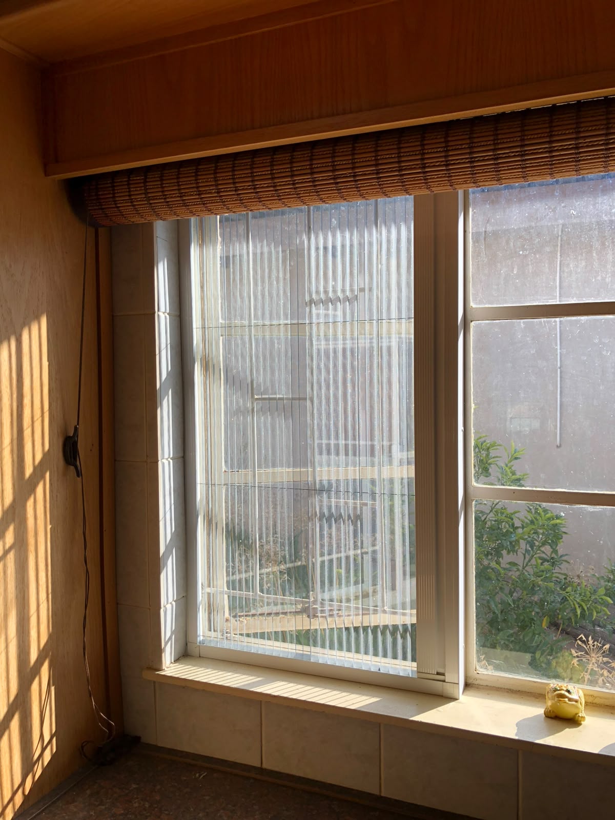 Custom flyscreen fitted to a steel-frame opening 3