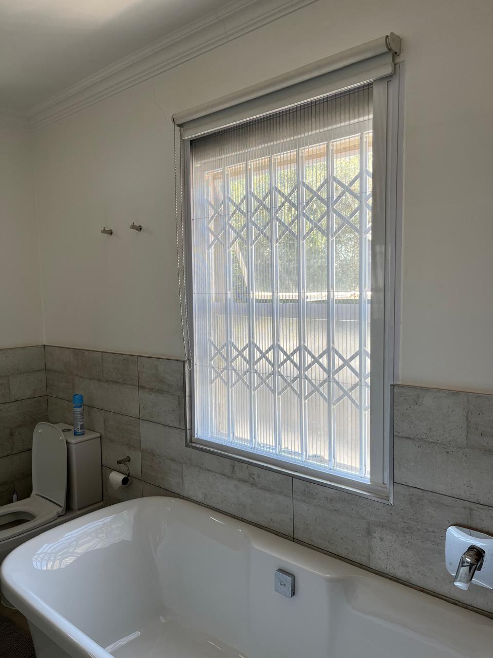 Custom flyscreen fitted to a steel-frame opening 7