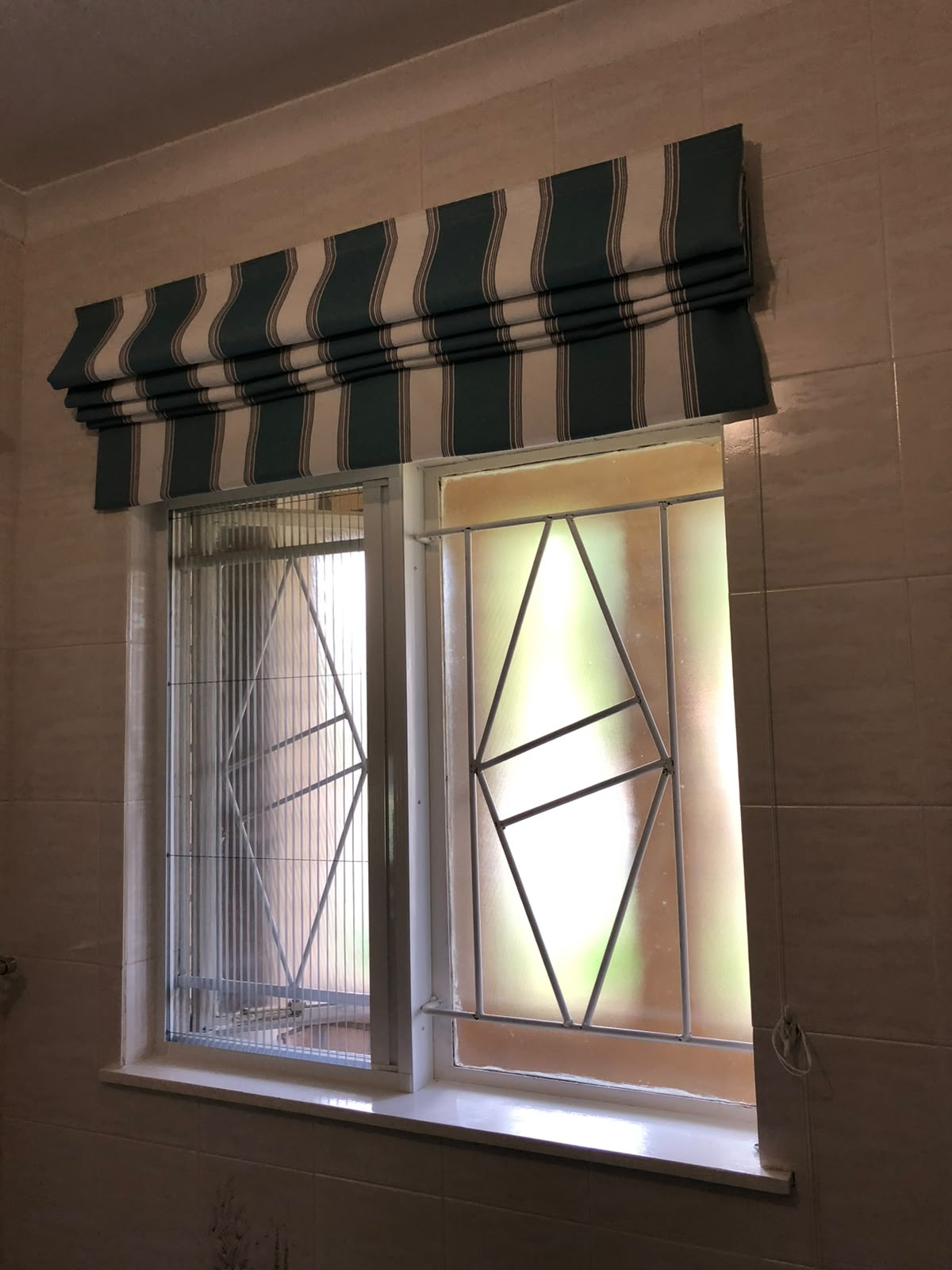 Custom flyscreen fitted to a steel-frame opening 9