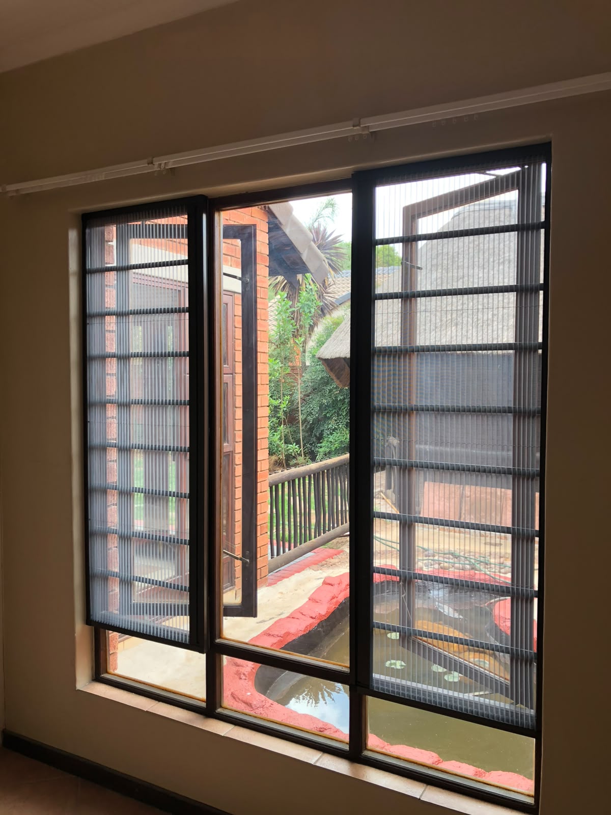 Custom flyscreen fitted to a wooden window 6